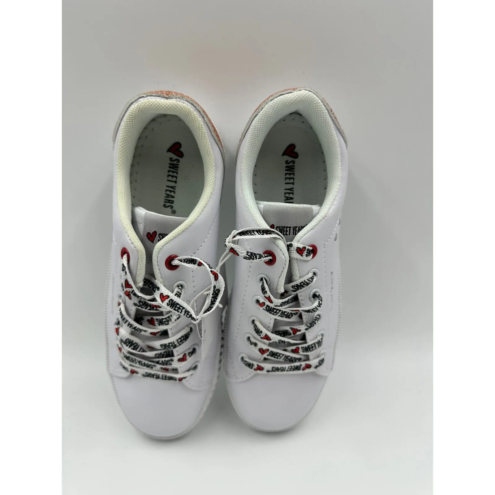 Small Kid Size 11 White Fashion Sneaker, Leather with Straps and Rose Gold Accents